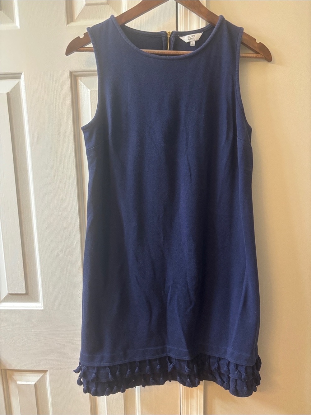 Sleeveless Navy Shift Dress with Tassel Hem